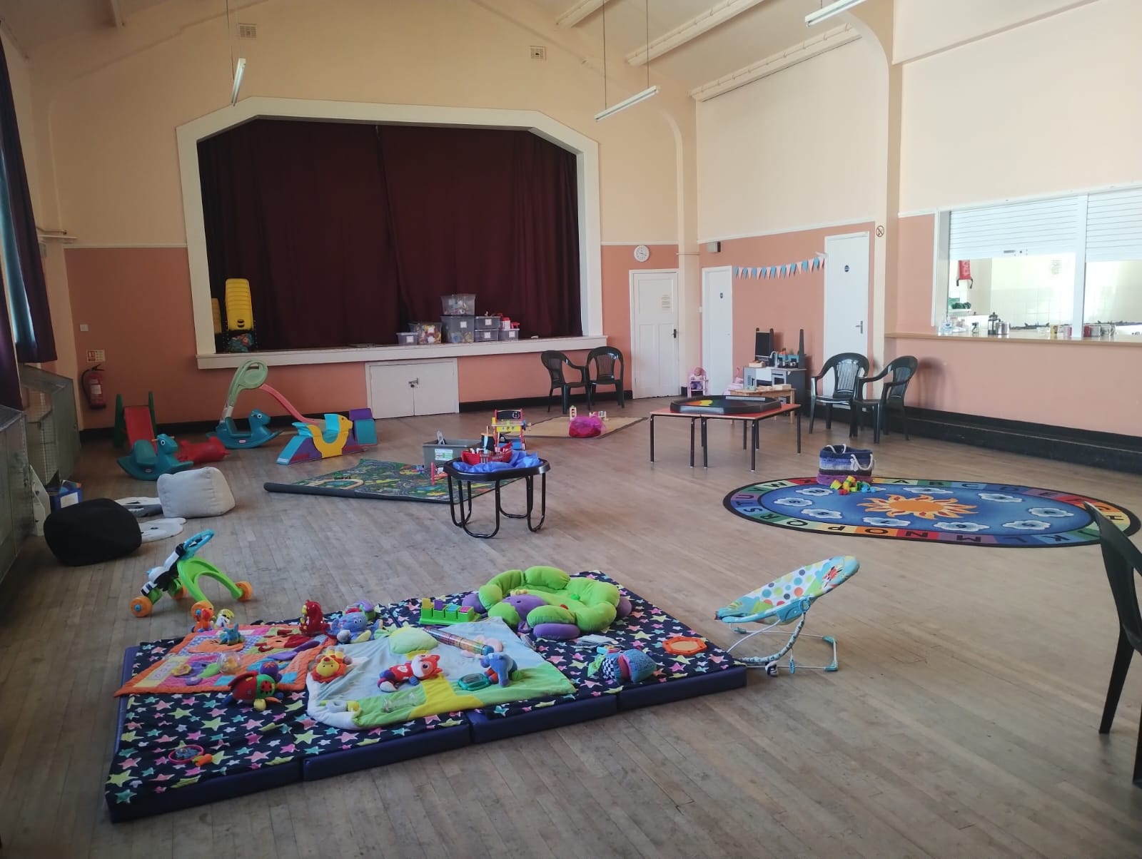 Typical Little Stars session, soft mats and toys for babies, a craft activity lots of toys, a house corner, messy play and crafts